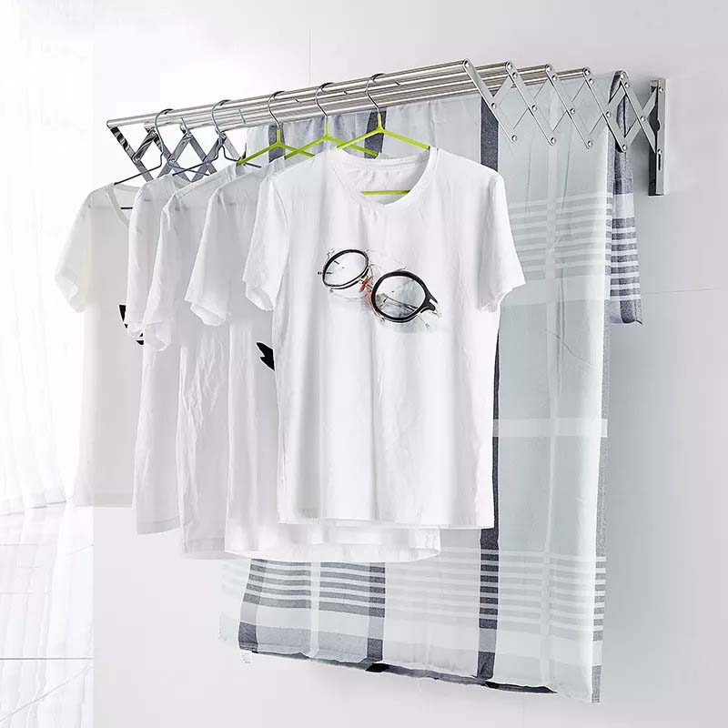 Clothes rack to hang clothes on the wall/منشر تعليق الملابس في الحائط