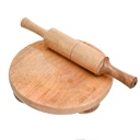 The rolling of wooden dough with a roll/فرادة العجين الخشبية مع رولة