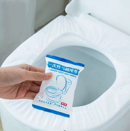 DISPOSABLE TOILET SEAT CUSHION / غطاء المرحاض
